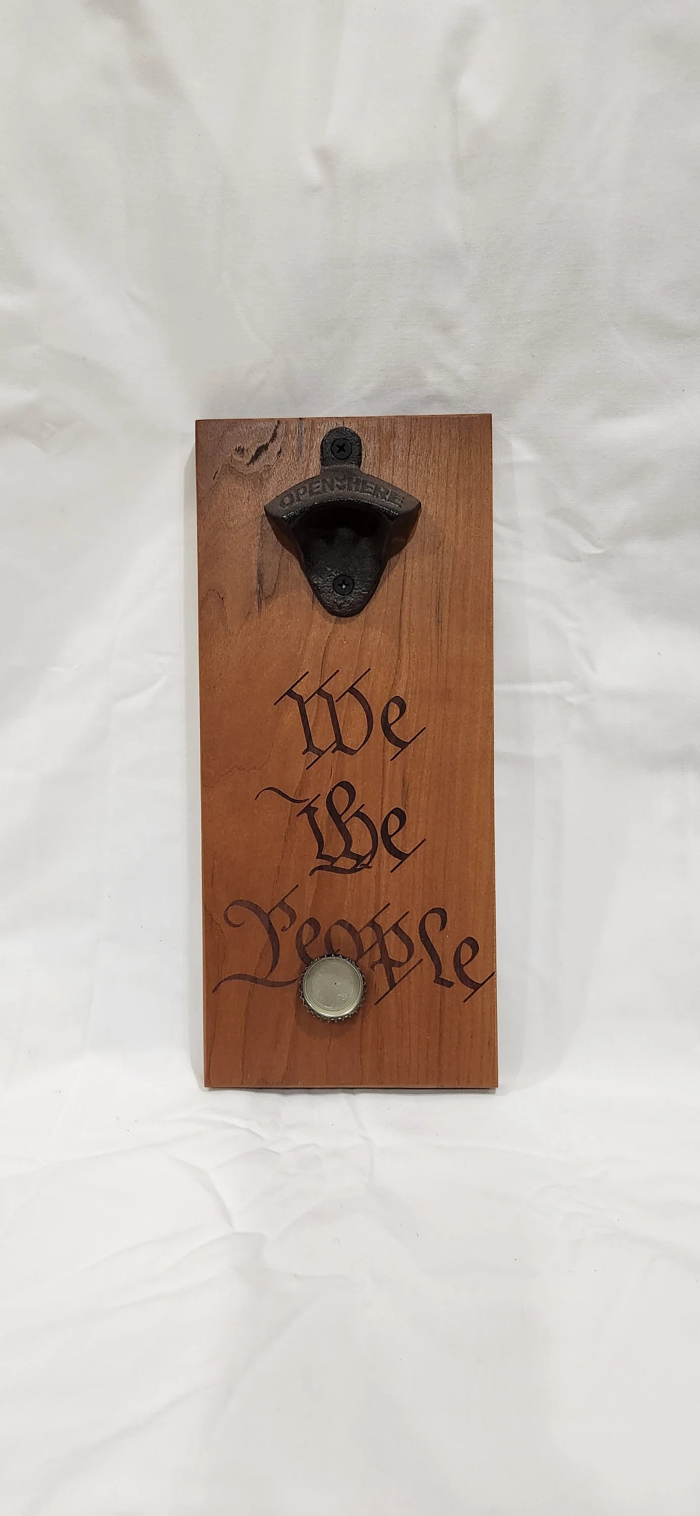 Magnetic engraved bottle opener